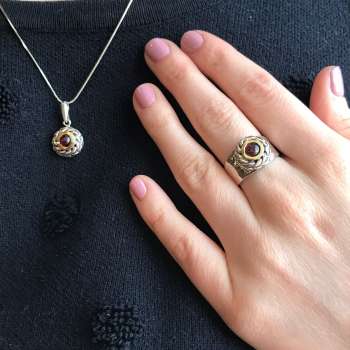 Серебряное кольцо с гранатом и золотом MVR1652GGR